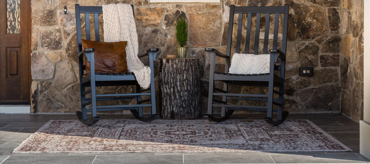 Outdoor rug on front porch