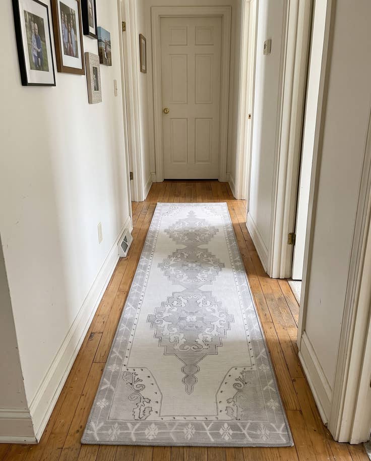 Detail image of 2' x 7' 10 Sanderson · Medallion Washable Rug, gray and white