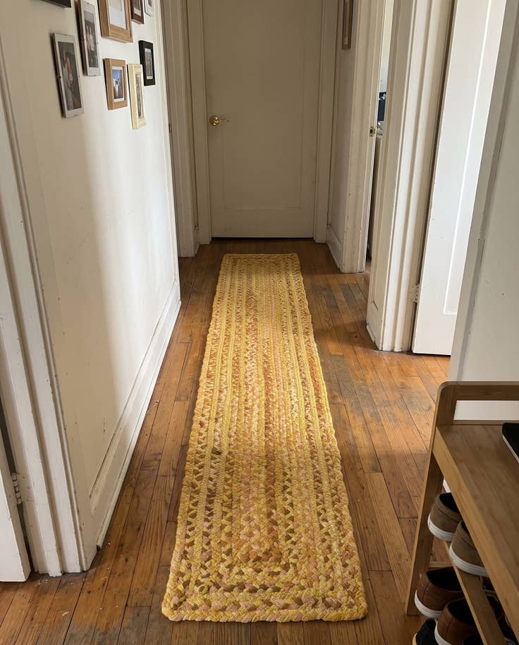 Detail image of 1' 2 x 8' Heywood · Braided Chindi Rug, yellow and orange