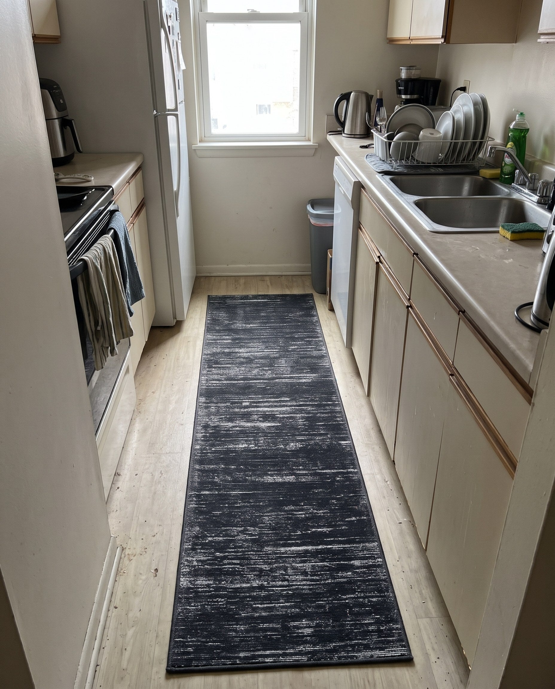 2' x 4' Prewitt · Linear abstract rug, black and ivory