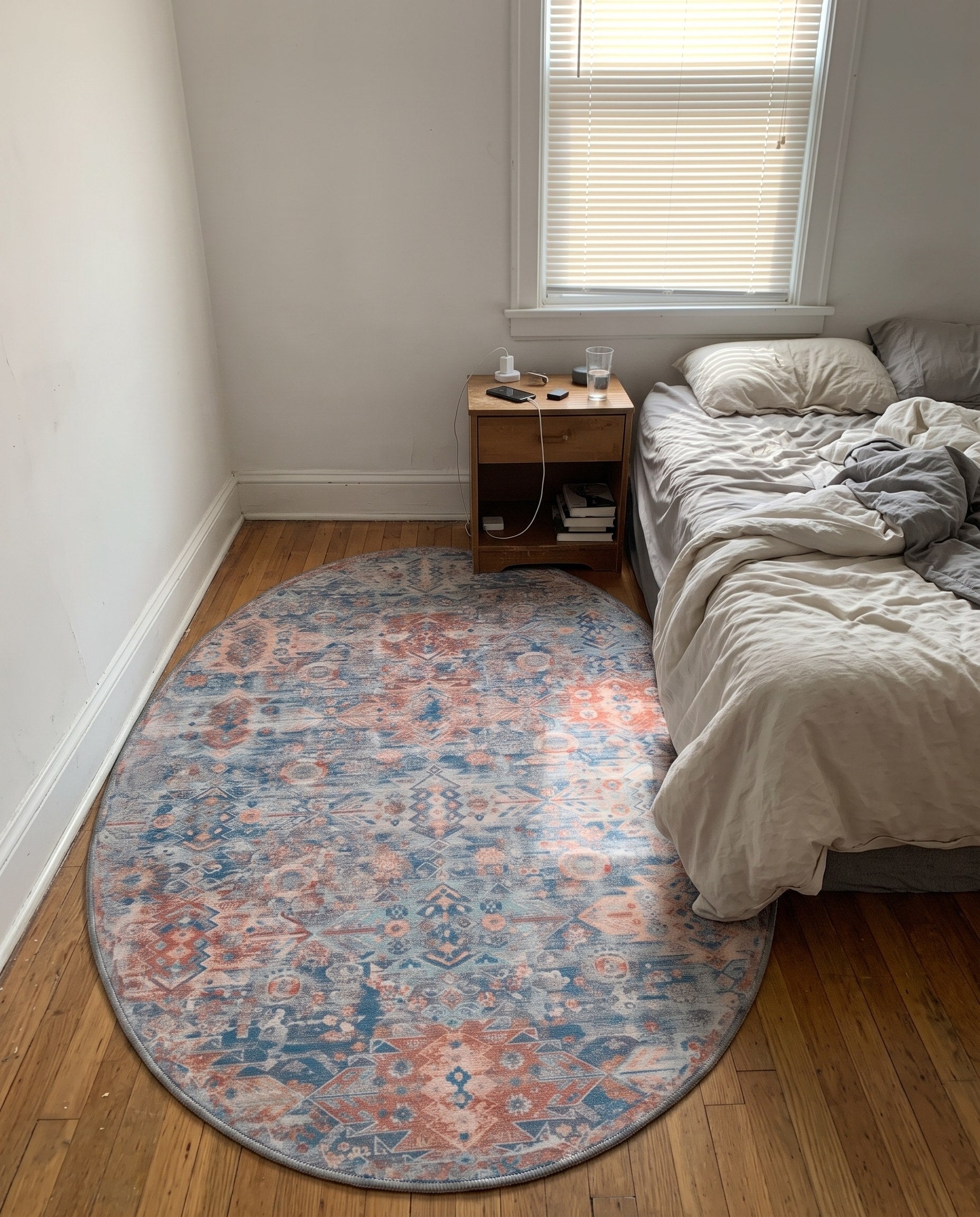 5' x 8' Waters · Geometric medallion Washable Rug, blue and rust
