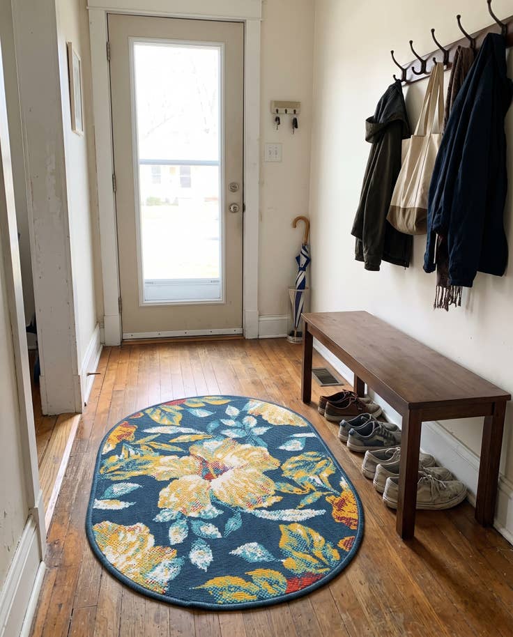 Detail image of 2' x 3' Bickford · Tropical floral Outdoor Rug, navy and yellow
