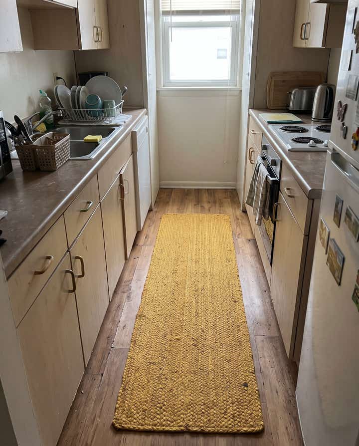 1' 2 x 10' Marlin · Solid braided Braided Jute Rug, warm mustard yellow