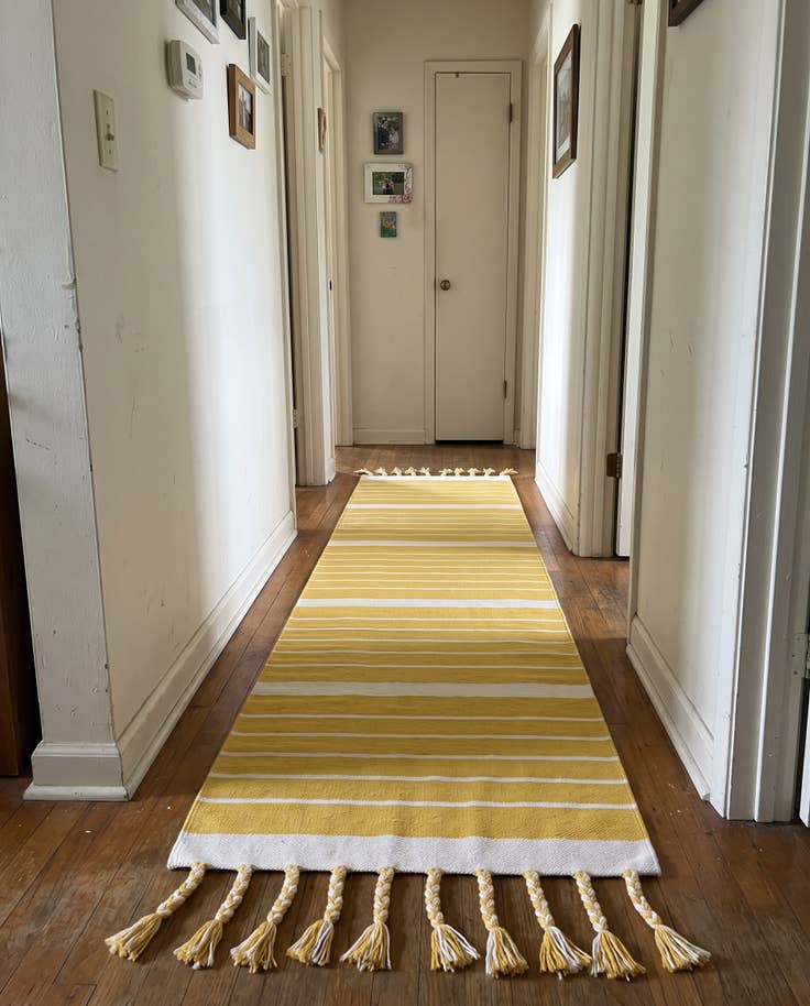 Detail image of 2' 7 x 12' Ottley · Striped Chindi Rug, yellow and white