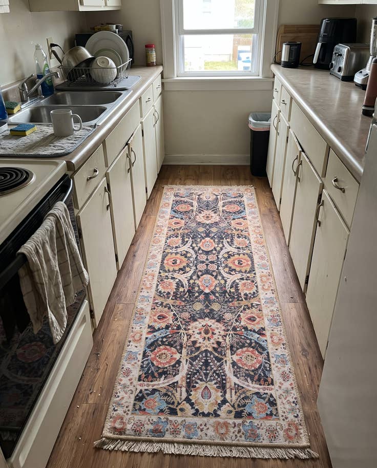 Detail image of 2' x 5' 1 Starr · Floral Washable Rug, black and red