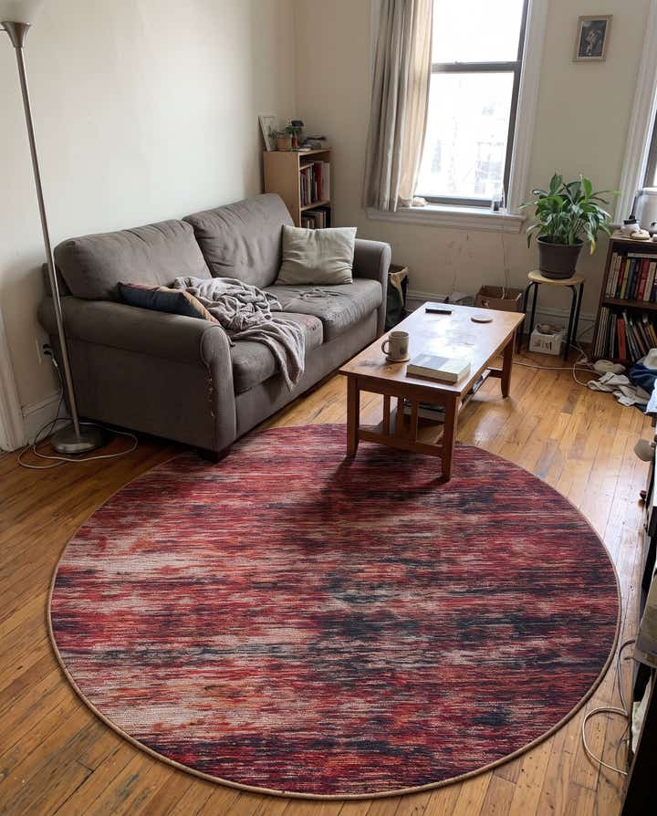 5' x 5' Prewitt · Abstract rug, rust red