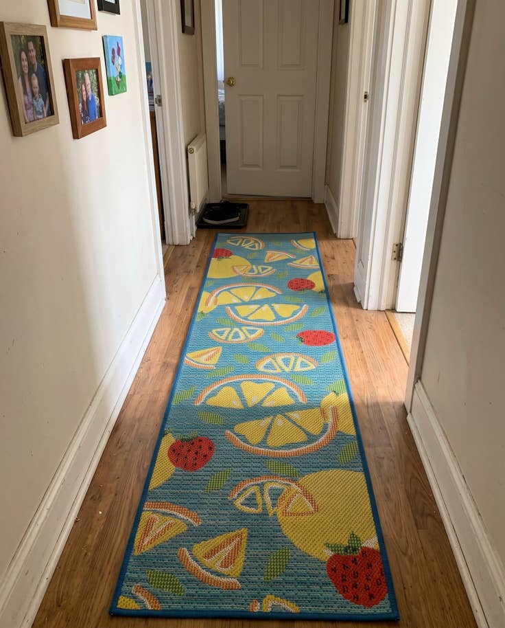 Detail image of 2' 7 x 12' Masterson · Citrus fruit Outdoor Rug, blue and yellow