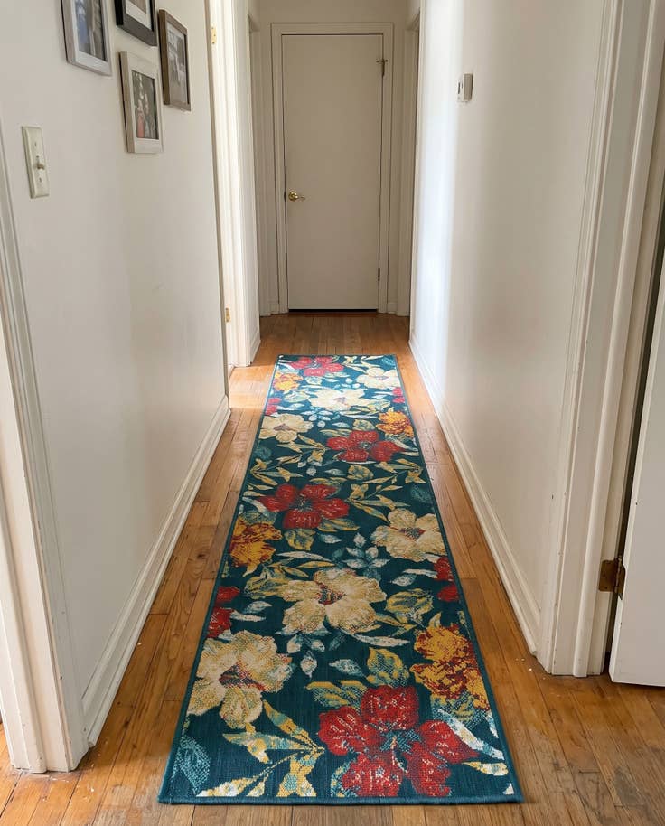 Detail image of 2' 7 x 13' Bickford · Tropical floral Outdoor Rug, navy and yellow