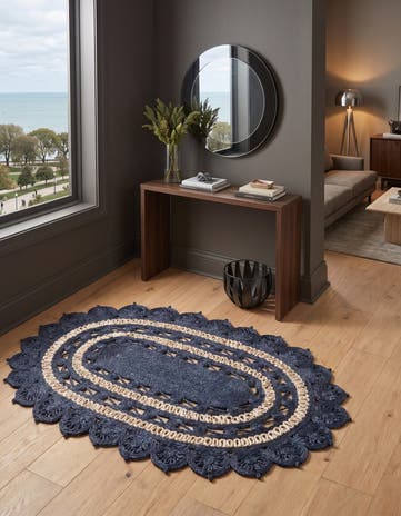 4' 1 x 6' 1 Handmade Braided Jute Oval Rug