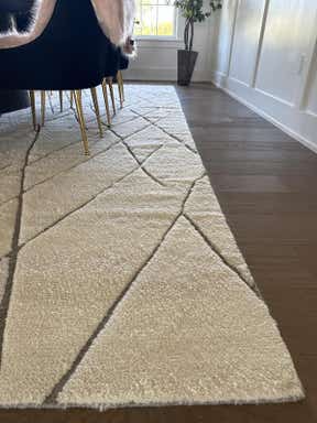 Customer photo for review titled "This carpet doesn’t worth the money."