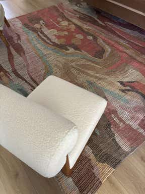 Customer photo for review titled "Great neutralist rug with pops of color"