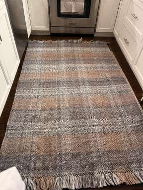 Customer photo for review titled "Plaid rug"