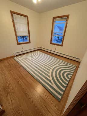 Customer photo for review titled "Cute rug but arrived damaged"