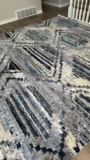 Customer photo for review titled "I absolutely love the new rug."