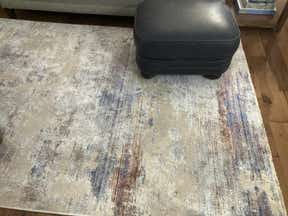 Customer photo for review titled "Great rug for living room"