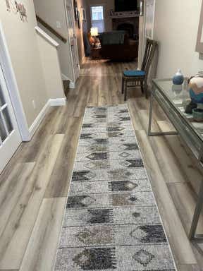 Customer photo for review titled "Love this rug"