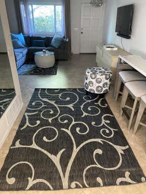 Customer photo for review titled "Cool looking indoor/outdoor rug i love it ❤️!"