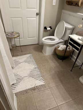 Customer photo for review titled "Beautiful accent for a black and white bathroom"