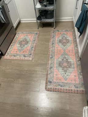 Customer photo for review titled "Nice and cushy upgrade to my kitchen rugs!"