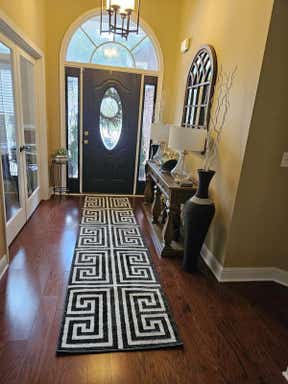 Customer photo for review titled "Beautiful rug and runner"