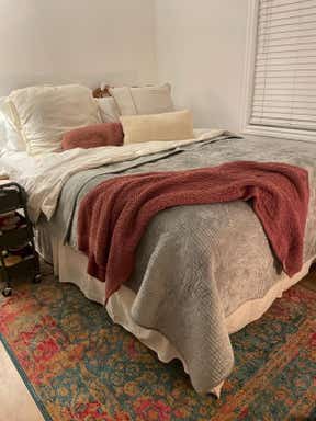 Customer photo for review titled "Bright bold and beautiful rug"