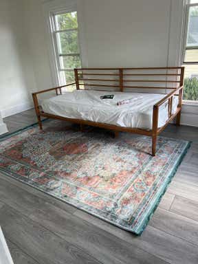 Customer photo for review titled "This Rug really brings a room together!"