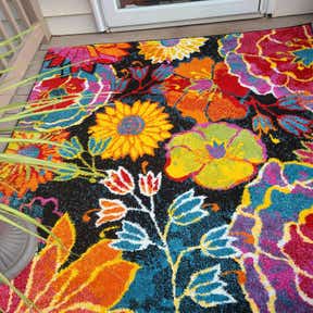 Customer photo for review titled "Brilliant colorful rug"
