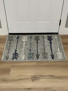 Customer photo for review titled "Cute Entryway Rug"
