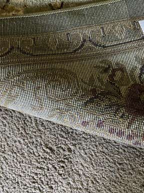 Customer photo for review titled "My dining room rug"