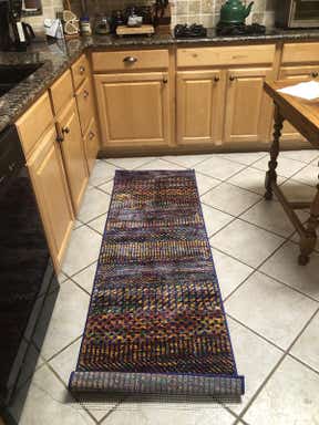 Customer photo for review titled "Colorful unique rugs!"