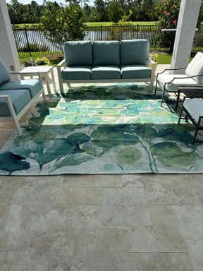 Customer photo for review titled "Rug is better than expected!"