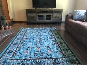Customer photo for review titled "The color brightens up this dark wood."