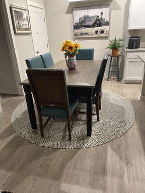 Customer photo for review titled "7' 10 x 7' 10 Hand Tweed Braided Jute Round Rug"