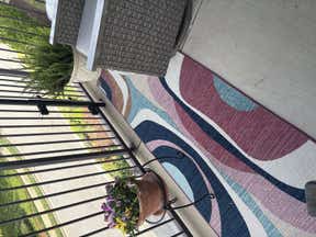 Customer photo for review titled "Pretty Rug for Balcony"