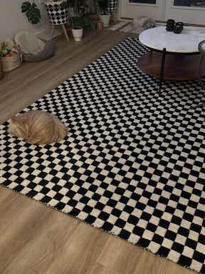 Customer photo for review titled "Love this Black & White Wool Checkered Rug"