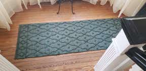 Customer photo for review titled "Beautiful rug."