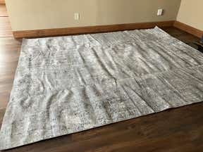 Customer photo for review titled "RUINED RUG"