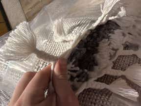 Customer photo for review titled "The rug is not the same as the first advertised photo!"