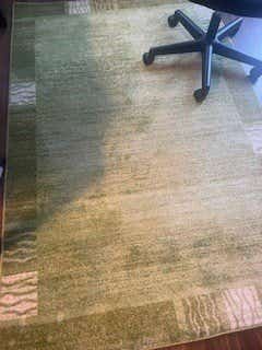 Customer photo for review titled "The Angelica rug is the perfect fit for my den!"
