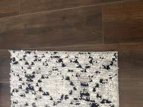 Customer photo for review titled "Uneven edges and colors between sizes not the same"