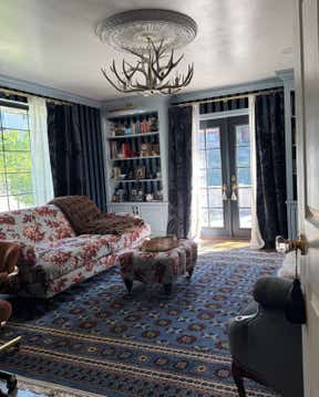 Customer photo for review titled "This rug really ties the room together"