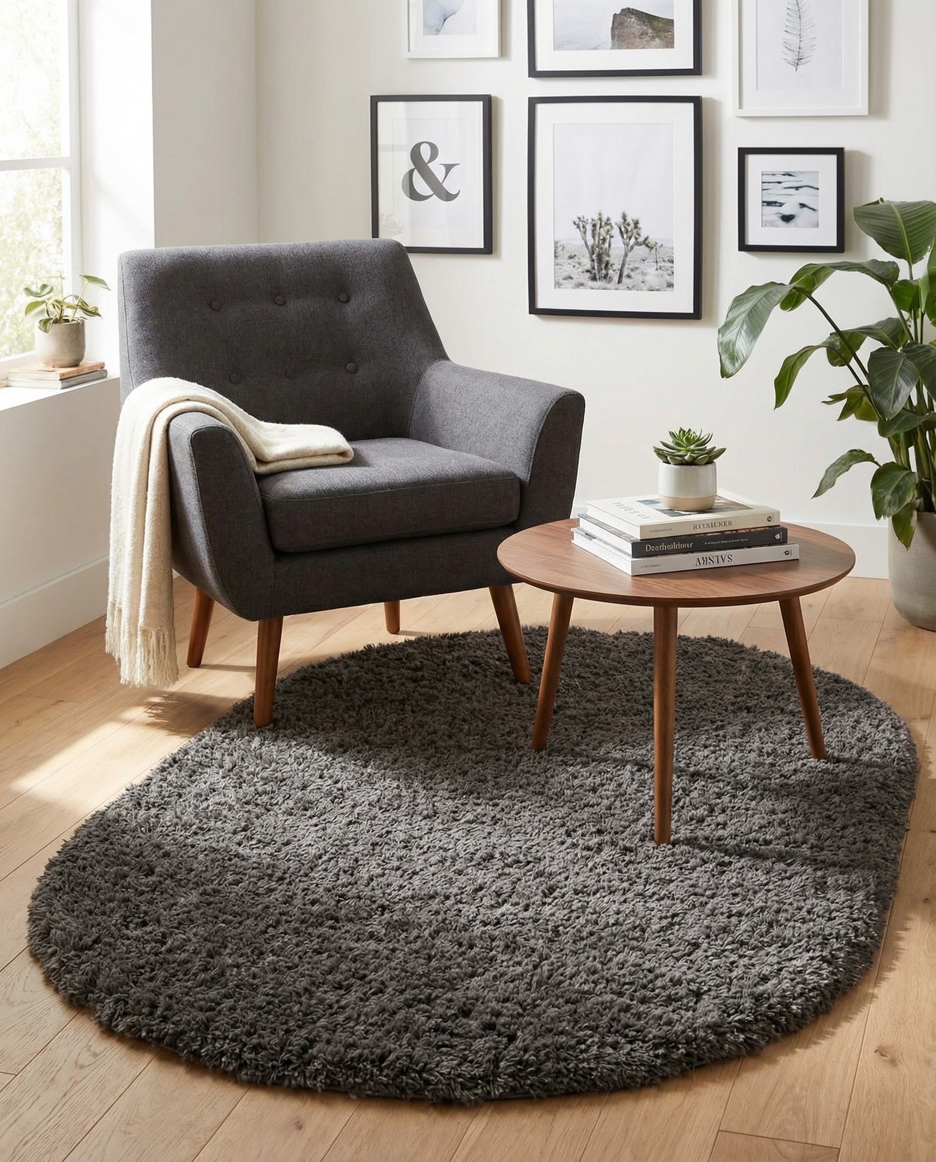 A 4'x6' oval gray shag rug with a plush, textured pile, suitable for adding comfort to any indoor space.
