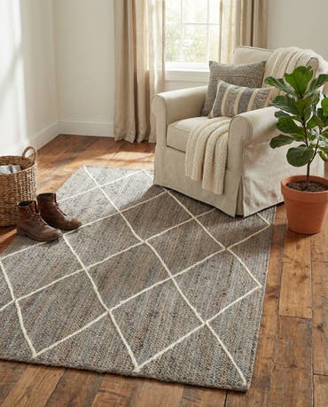  4' 1 x 6' 1  Hand Braided Jute Rug