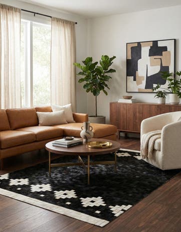 5' 2 x 8' 1 Cowhide Stocks Rug