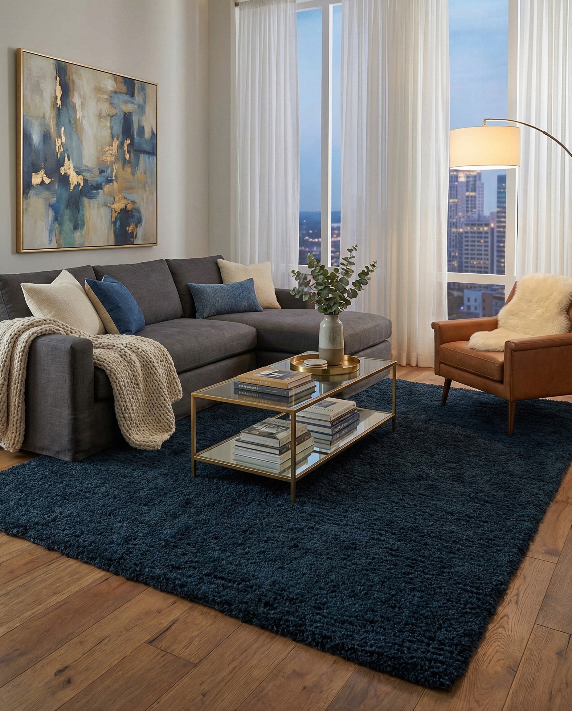 A plush 10x13 rectangular blue shag rug with a textured pile, perfect for a modern living room or bedroom.