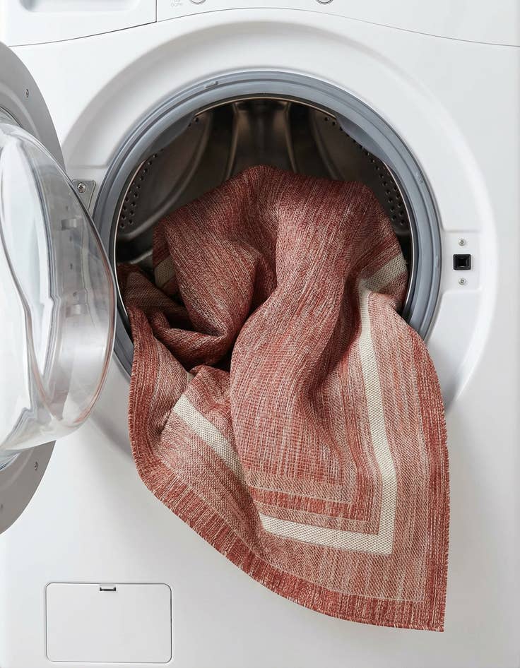 Detail image of 7' x 10'  Washable Border Indoor / Outdoor Rug