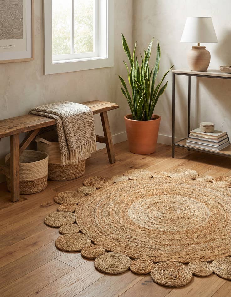 Detail image of  4' 1 x 4' 1  Hand Braided Jute Round Rug
