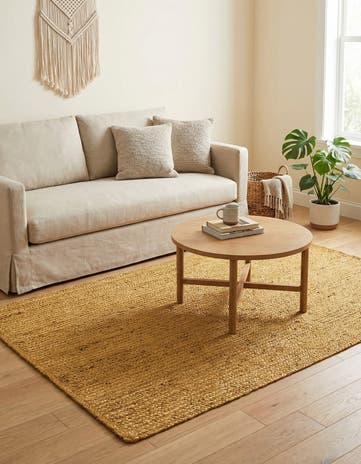 4' 1 x 6' 1 Handmade Braided Jute Rug