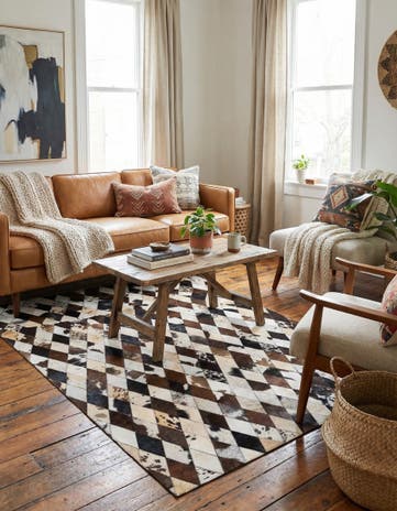 4' 8 x 6' 9 Cowhide Stocks Rug