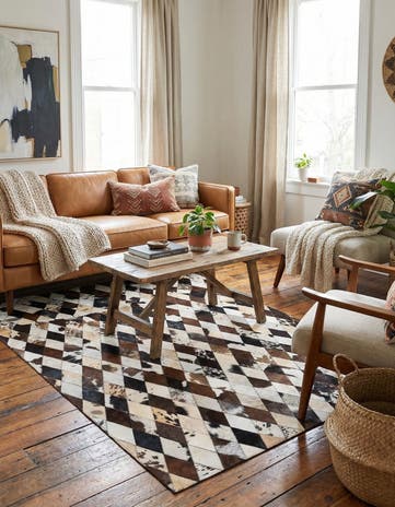 4' 8 x 6' 9 Cowhide Stocks Rug